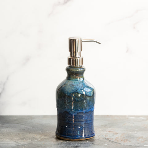 Ceramic soap dispenser in light blue glaze