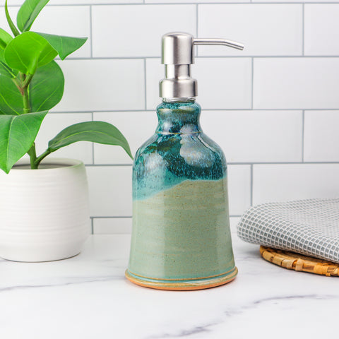 Ceramic soap dispenser with light blue glaze